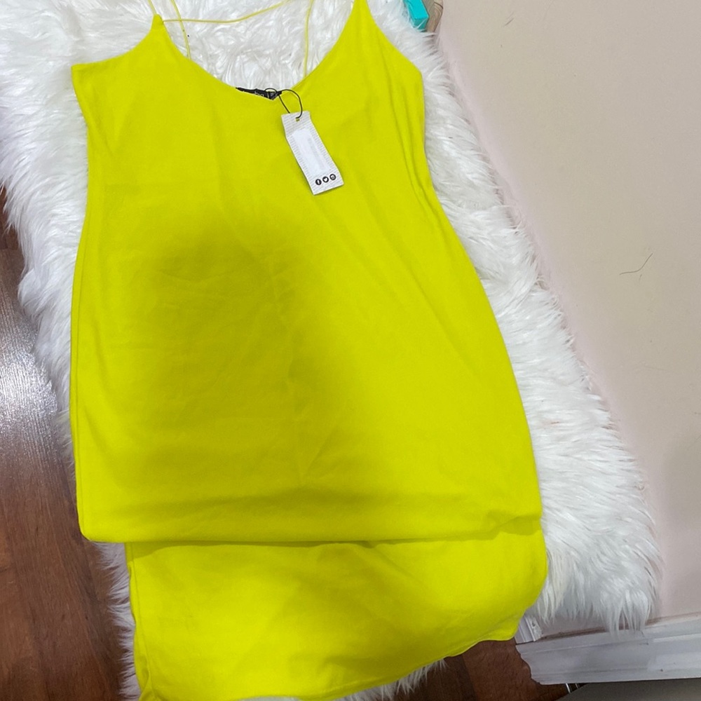 Neon green mini dress with fancy neckline